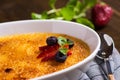 Creme Brulee Dessert with Caramelised Sugar, Strawberry, Blueberry and Fresh Mint Leaves Royalty Free Stock Photo