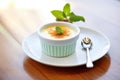 creme brulee with mint leaf garnish Royalty Free Stock Photo