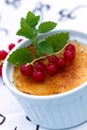 Creme Brulee with red Currants, on White