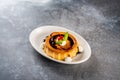 creme caramel served in a dish isolated on dark background side view dessert