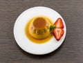 Creme caramel vanilla custard dessert or flan on white dish Royalty Free Stock Photo