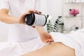 Creme treatment on woman legs with hydrating lotion. Preventing dry skin on female body parts close-up. Therapeutic Royalty Free Stock Photo