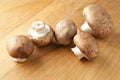 Cremini Mushrooms on Wood Surface Royalty Free Stock Photo