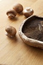 Cremini and Portobello Mushrooms on Wood Surface Royalty Free Stock Photo