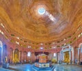 Interior of Cremona Baptistery with baptismal font and altars, on April 6 in Cremona, Italy