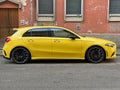 yellow german compact design sport city car parked in the street Royalty Free Stock Photo