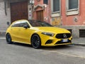 yellow german compact design sport city car parked in the street Royalty Free Stock Photo