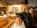 Cremona Italy May 2021 Senior italian man having happy hour red wine at local osteria Royalty Free Stock Photo