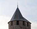 The Crenelated Roof Of A Conical Tower In Carcassonne Royalty Free Stock Photo