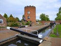 Crenelated tower and canal lock