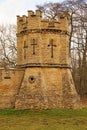 A Crenelated Tower Set inthe Corner of a Wall