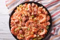 Creole jambalaya with shrimp and sausage close-up. horizontal t