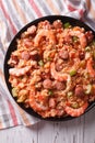 Creole jambalaya with shrimp and sausage close-up. vertical top Royalty Free Stock Photo