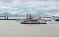 Creole Queen New Orleans Tour Boat on Mississippi River near Bridge Royalty Free Stock Photo