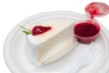 Crepe cake bakery piece with strawberry sauce