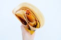 Crepe with Chocolate Sauce Dessert. Woman is Hands Holding Brown Pancake on White Background