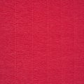 Crepe crinkled Paper texture in pinky red, abstract background