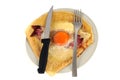 Crepe with egg, ham and cheese on a plate on a white background