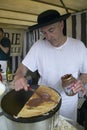 Crepe Stand with man making crepe at the Flea Market, Paris, France Royalty Free Stock Photo