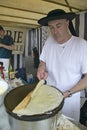 Crepe Stand with man making crepe at the Flea Market, Paris, France Royalty Free Stock Photo