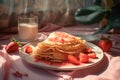 crepe with strawberries on plate