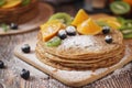 Crepes or bliny with fruits Royalty Free Stock Photo