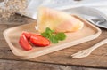 Crepes cake roll cream cheese with fresh strawberry. Royalty Free Stock Photo