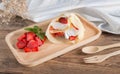 Crepes cake roll cream cheese with fresh strawberry. Royalty Free Stock Photo