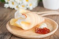 Crepes cake roll cream cheese with strawberry jam. Royalty Free Stock Photo