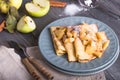 Crepes with caramelized quince and apple for dessert. Pancake Week.