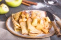 Crepes with caramelized quince and apple for dessert. Pancake Week.