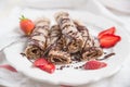 Crepes with chocolate and strawberries Royalty Free Stock Photo