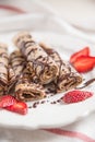 Crepes with chocolate and strawberries Royalty Free Stock Photo