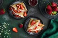 Crepes with cream cheese and fresh strawberry, top view Royalty Free Stock Photo