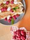 Crepes with cream and raspberry