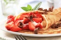 Crepes with curd cheese and strawberries