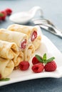 Crepes filled with cottage cheese and raspberry