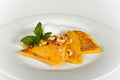 Crepes with Honey,nuts,orange souce and Mint Leaf