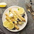 Crepes with lemon filling and blueberries