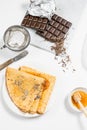 crepes on a plate with honey jam chocolate and sugar Royalty Free Stock Photo