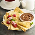 Crepes with raspberry and chocolate sauce
