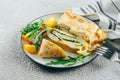 Crepes with stuffed cream cheese, spinach, turkey. Cuisine meal food concept. Closeup Royalty Free Stock Photo