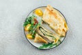 Crepes with stuffed cream cheese, spinach, turkey. Cuisine meal food concept. Top view Royalty Free Stock Photo