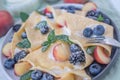 Crepes, thin pancakes or blini with berries Royalty Free Stock Photo