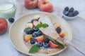 Crepes, thin pancakes or blini with berries Royalty Free Stock Photo