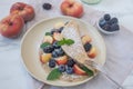 Crepes, thin pancakes or blini with berries Royalty Free Stock Photo