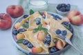 Crepes, thin pancakes or blini with berries Royalty Free Stock Photo