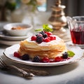 Crepes, thin pancakes with jam and fresh berries