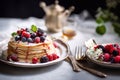 Crepes, thin pancakes with jam and fresh berries