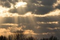 Crepuscular sun rays through cloud. Beautiful cloudy sky sunset Royalty Free Stock Photo